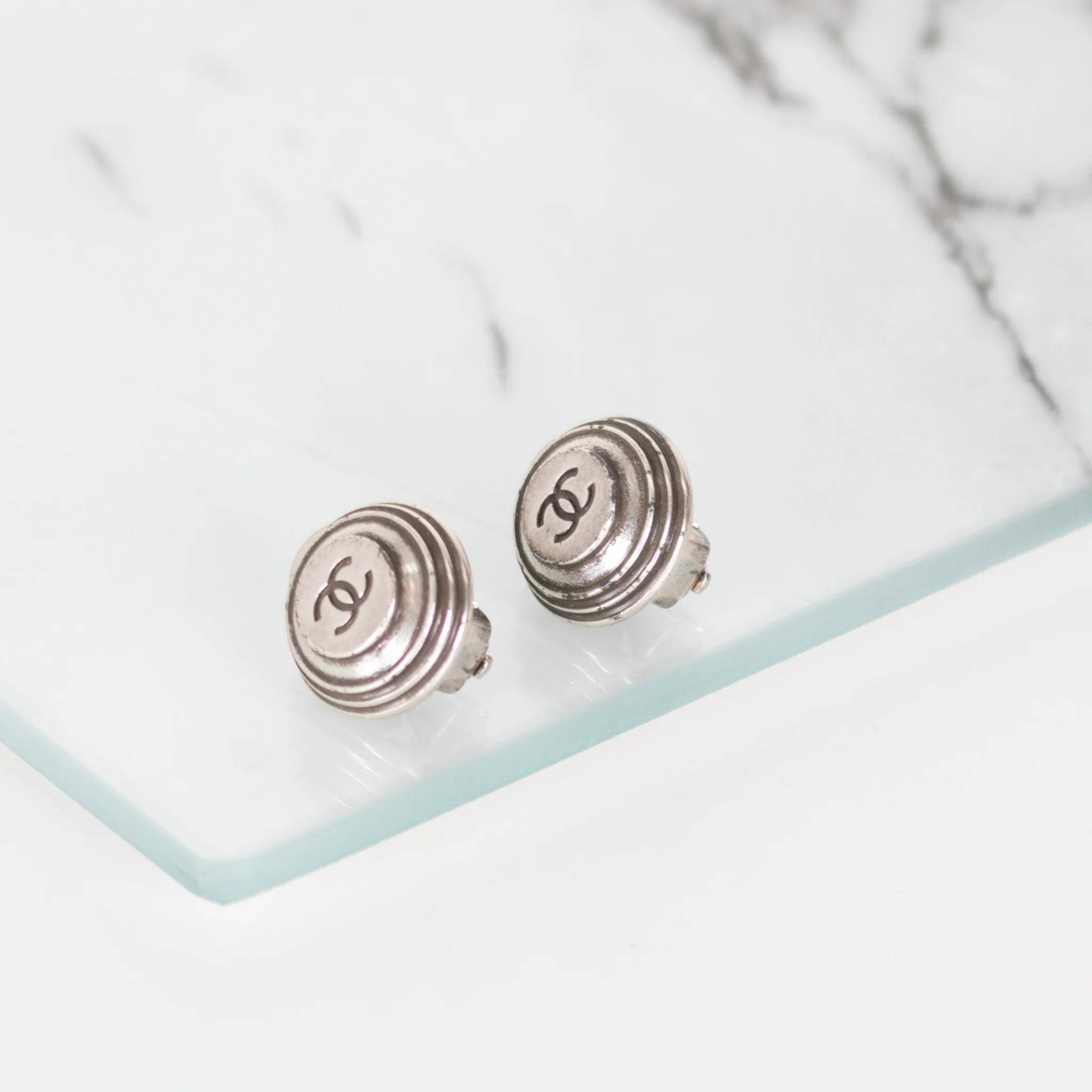 Chanel Silver CC Round Clip On Earrings - Image 3