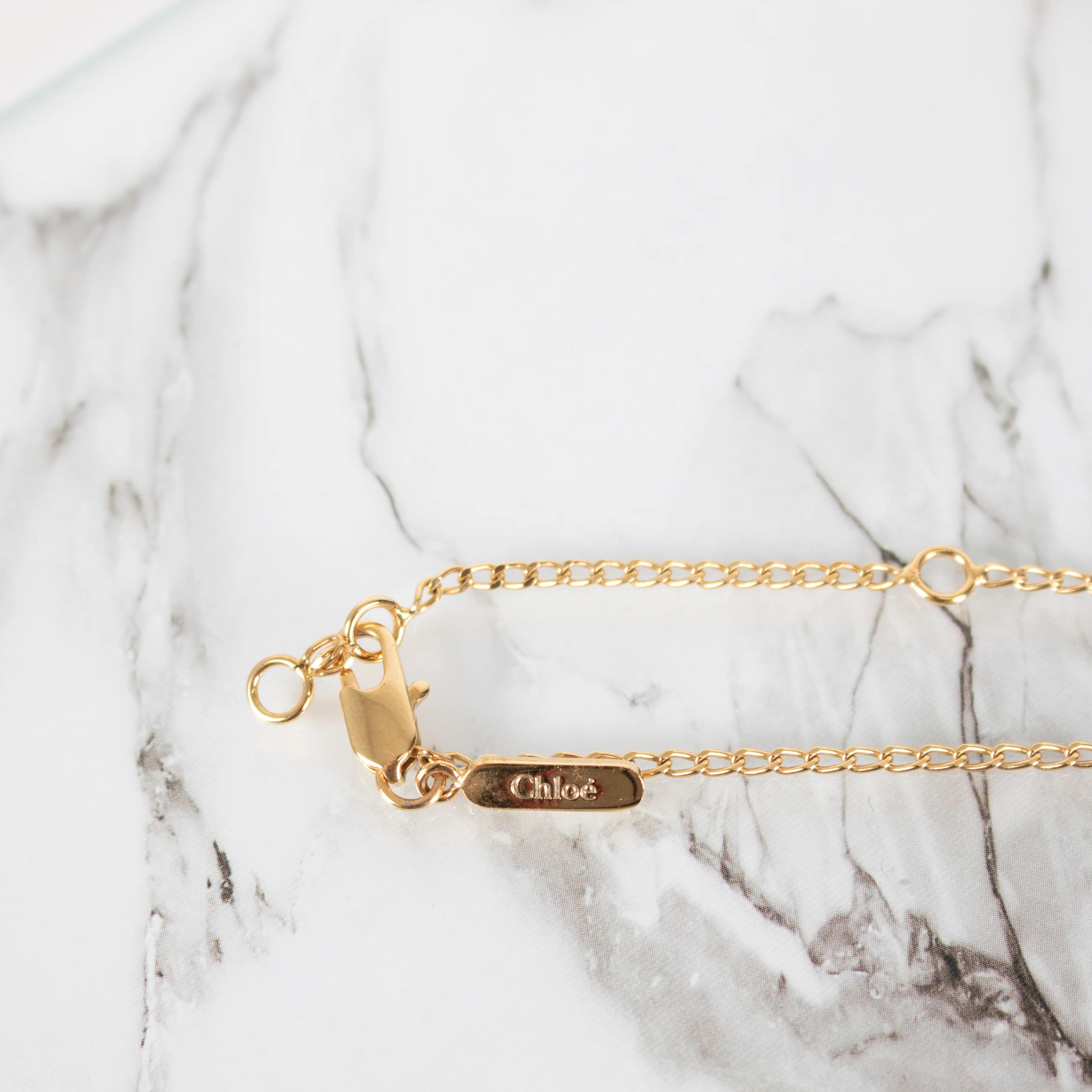 Chloe Femeniste Gold Tone Silhouette Necklace - Image 6