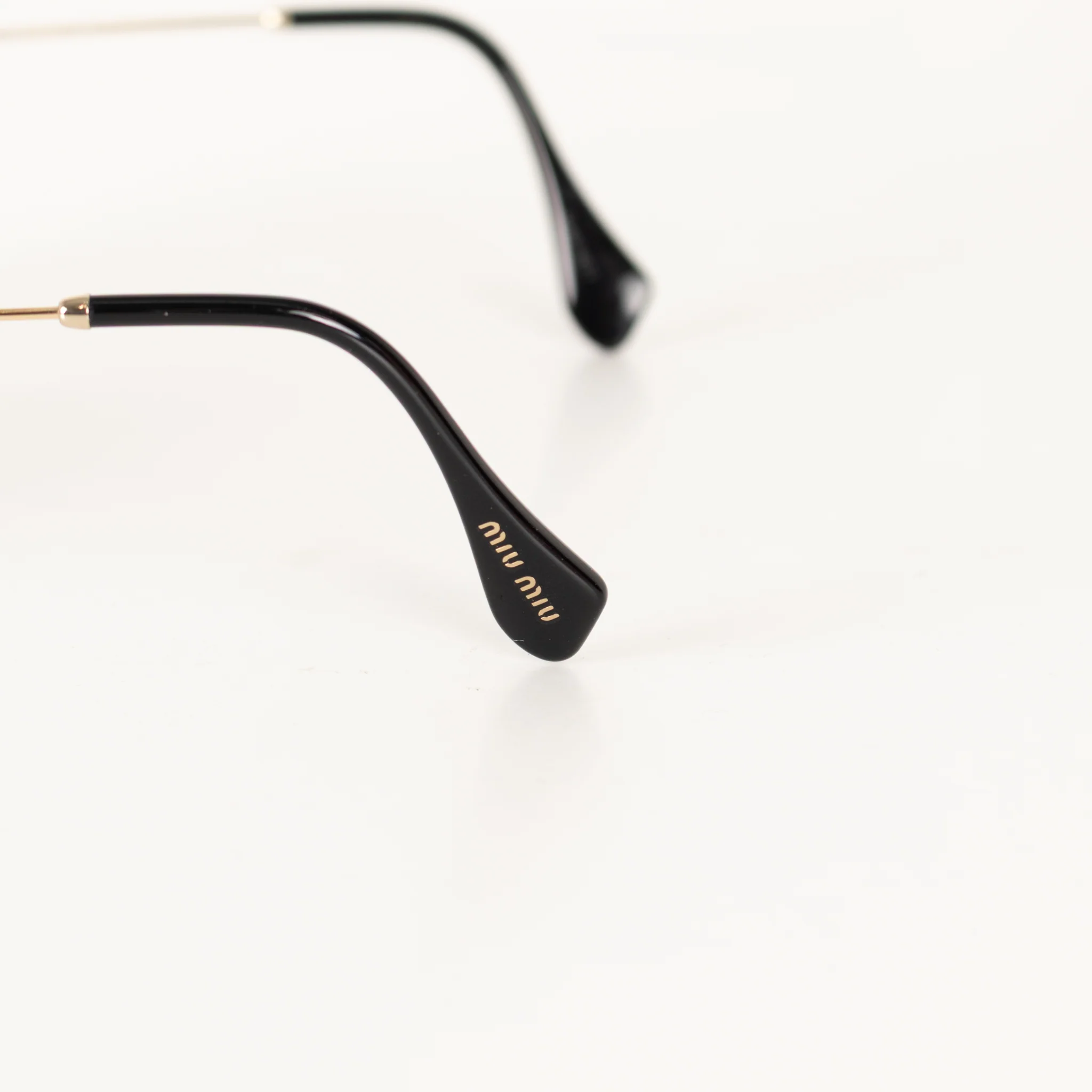 Miu Miu Sunglasses With Gold and Black Arms And Crystal Embellishsments - Image 10