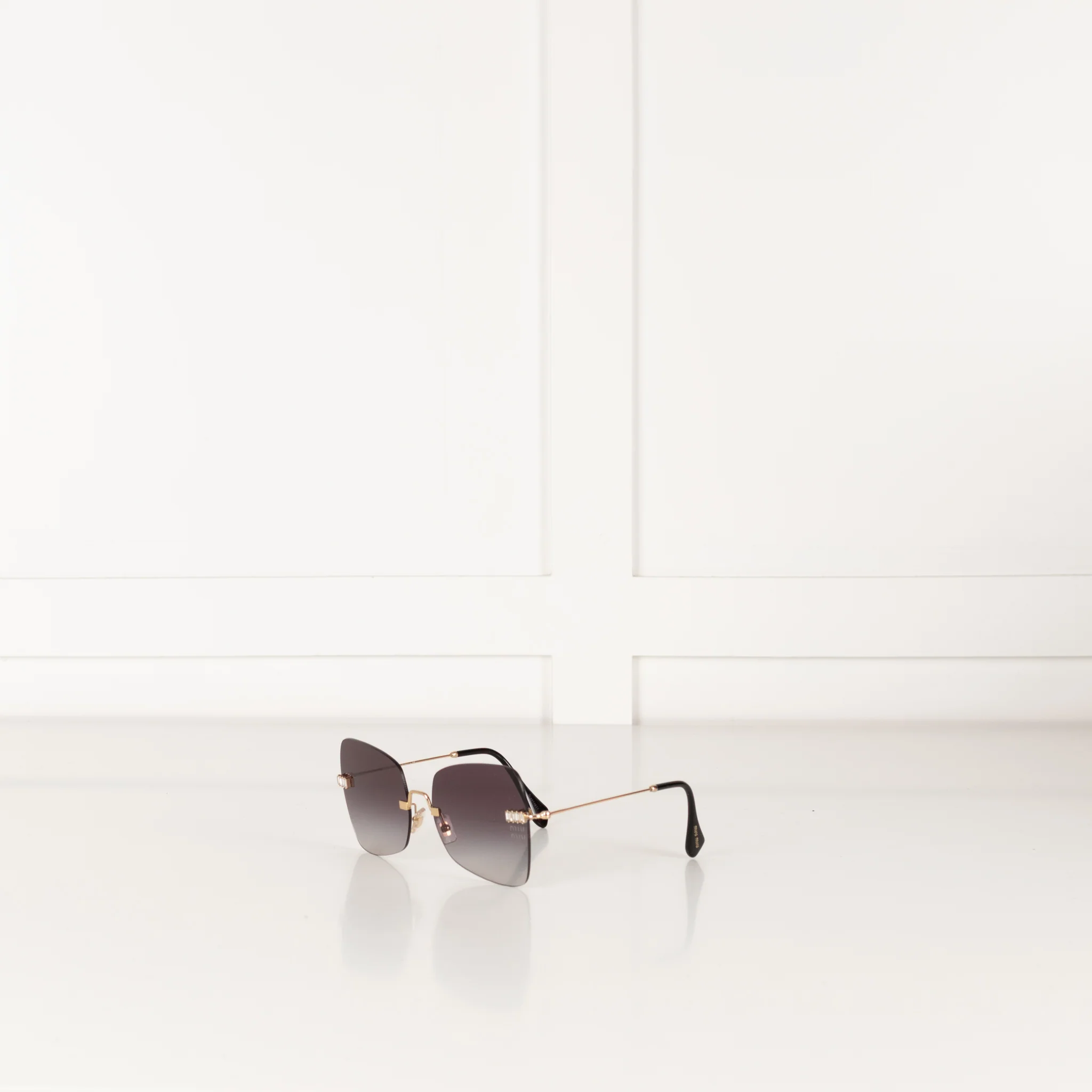Miu Miu Sunglasses With Gold and Black Arms And Crystal Embellishsments - Image 3