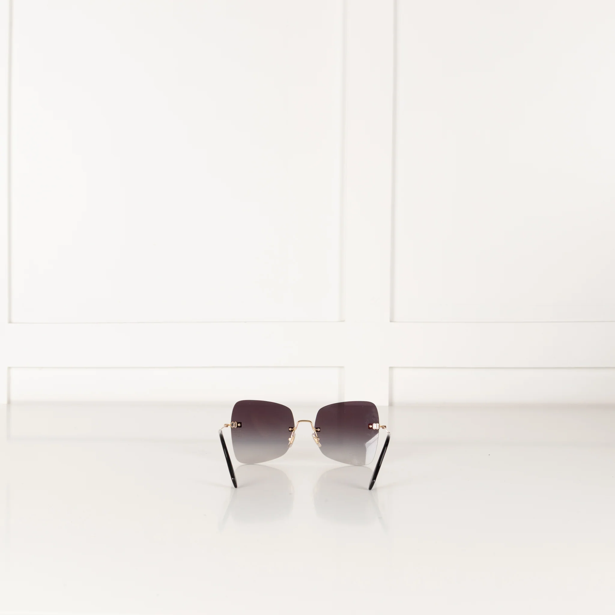 Miu Miu Sunglasses With Gold and Black Arms And Crystal Embellishsments - Image 5
