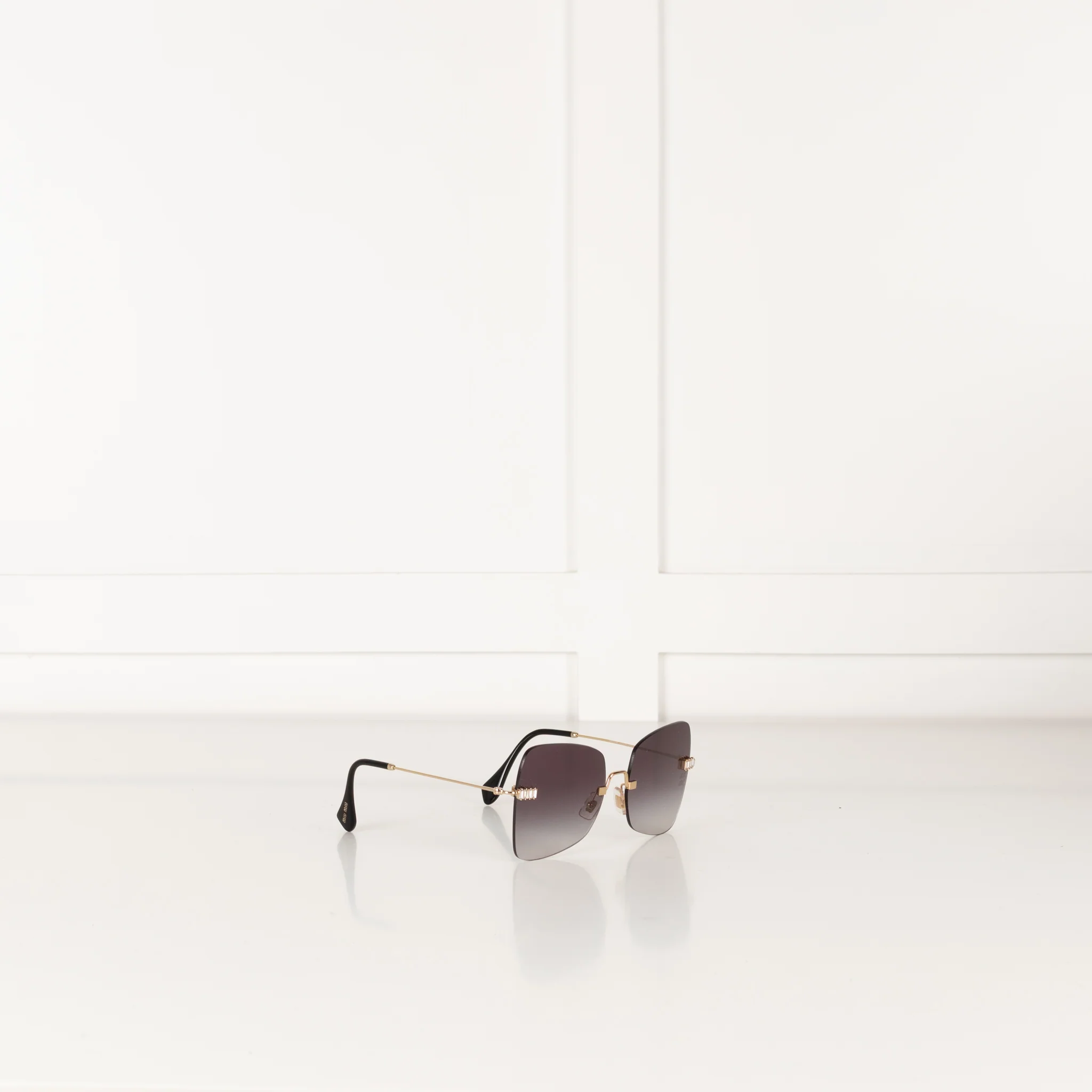 Miu Miu Sunglasses With Gold and Black Arms And Crystal Embellishsments - Image 7