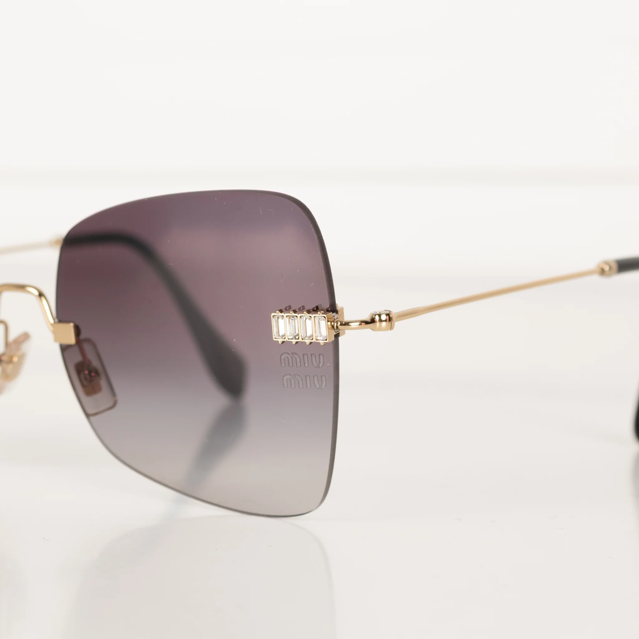 Miu Miu Sunglasses With Gold and Black Arms And Crystal Embellishsments - Image 9