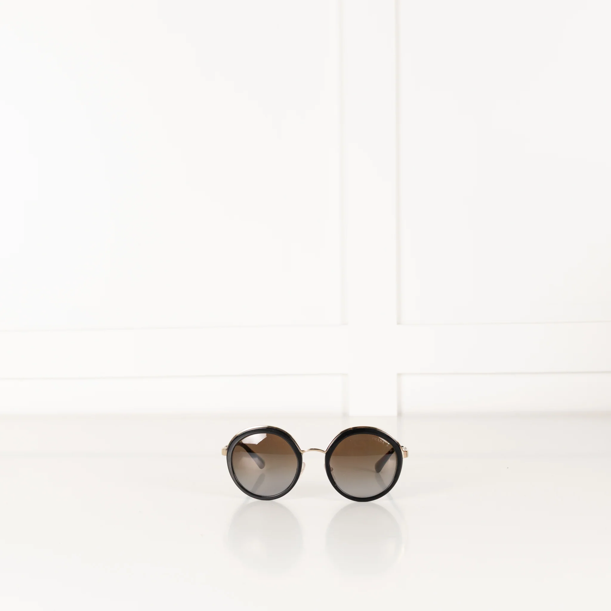 Prada Black & Gold Round Frame Sunglasses